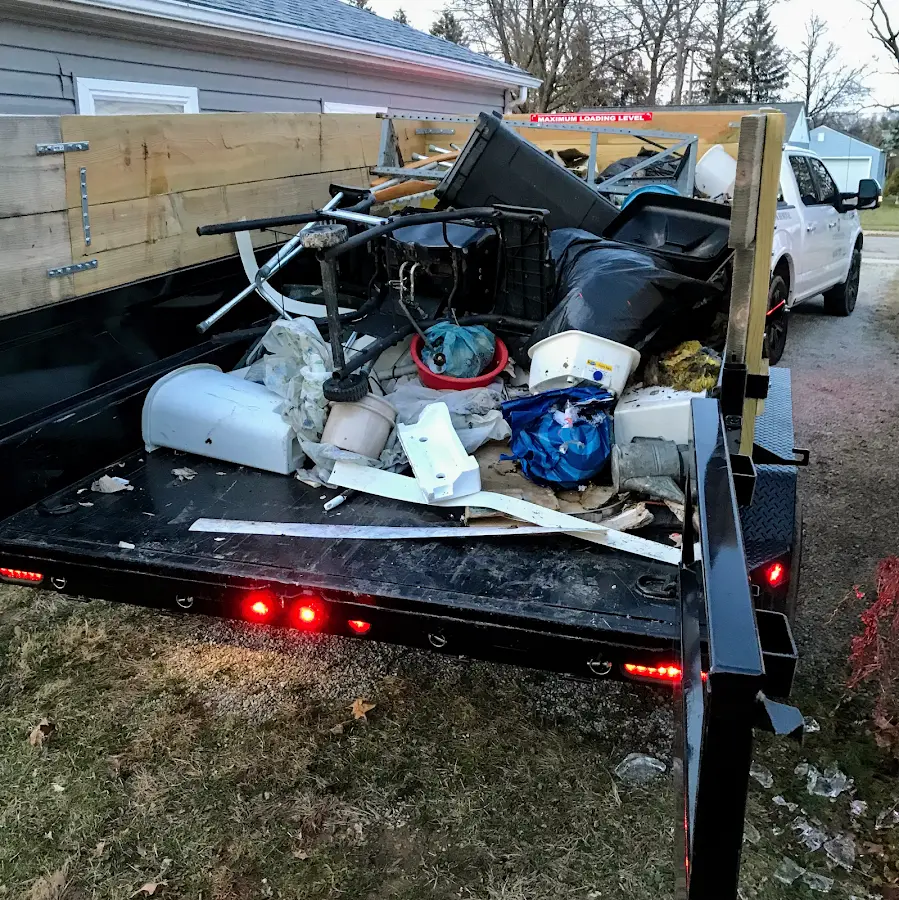 Roll-off dumpster delivered to a residential driveway in Kochville