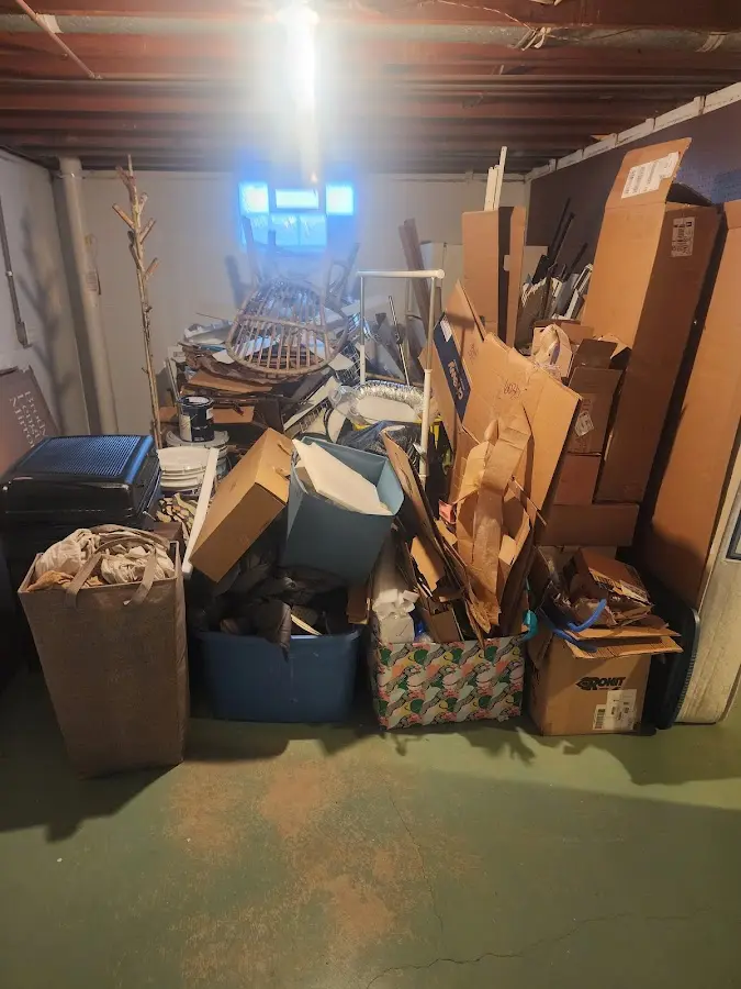 Roll-off dumpster container at job site for 2 Yard Dumpster Rental in Kochville